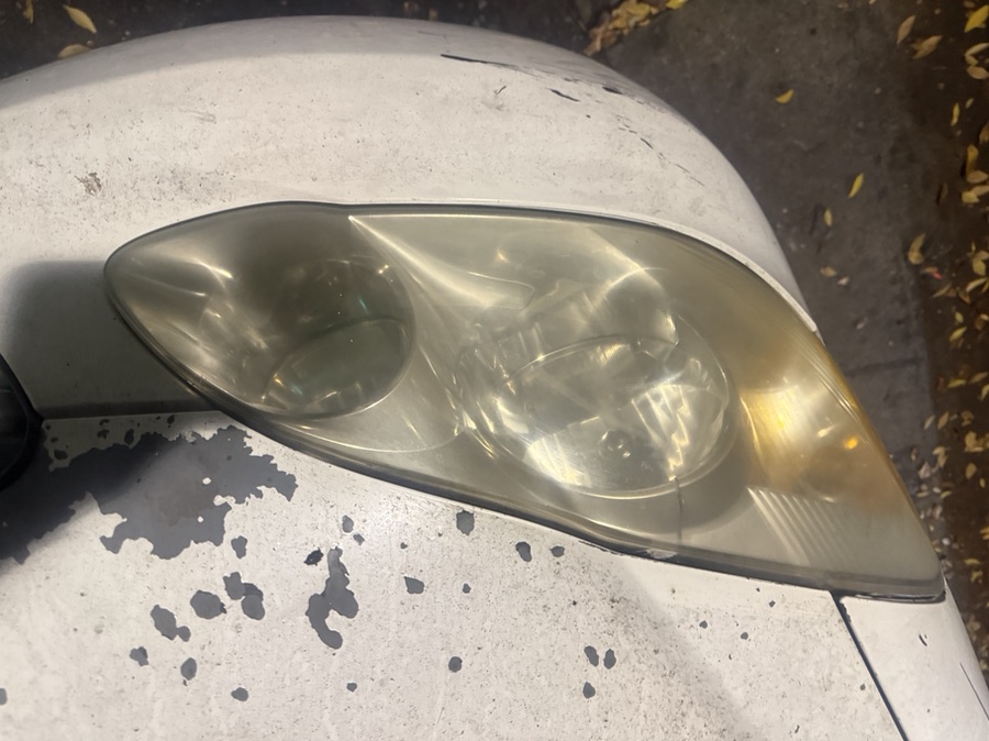 Oxidized headlight before restoration